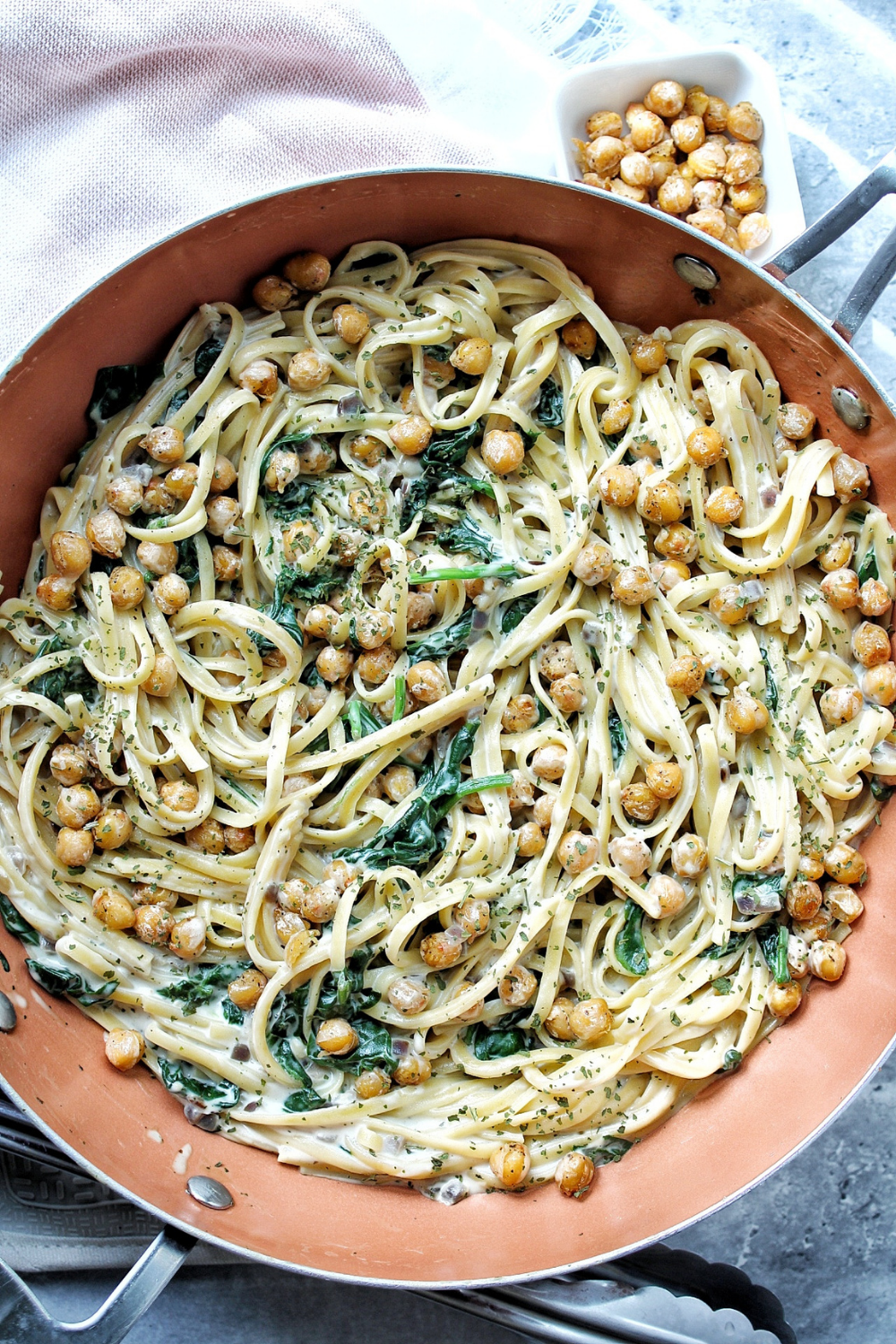 Creamy chickpea pasta garnished with parsley. 