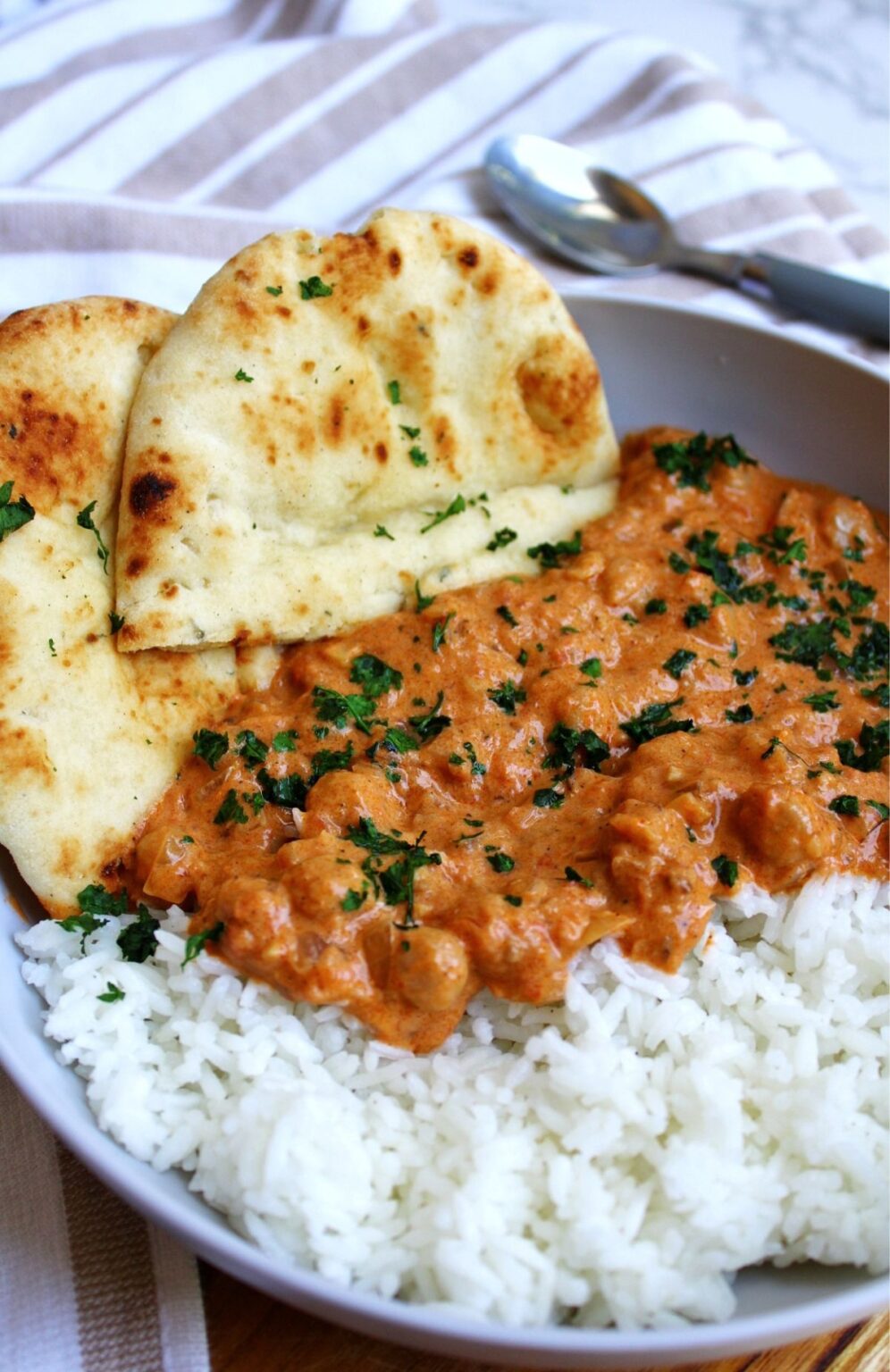 Chickpea curry with rice and naan. 