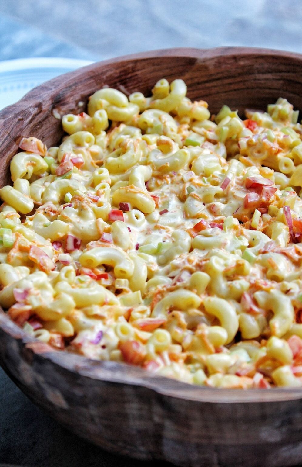 Vegan macaroni salad in a large serving bowl. 
