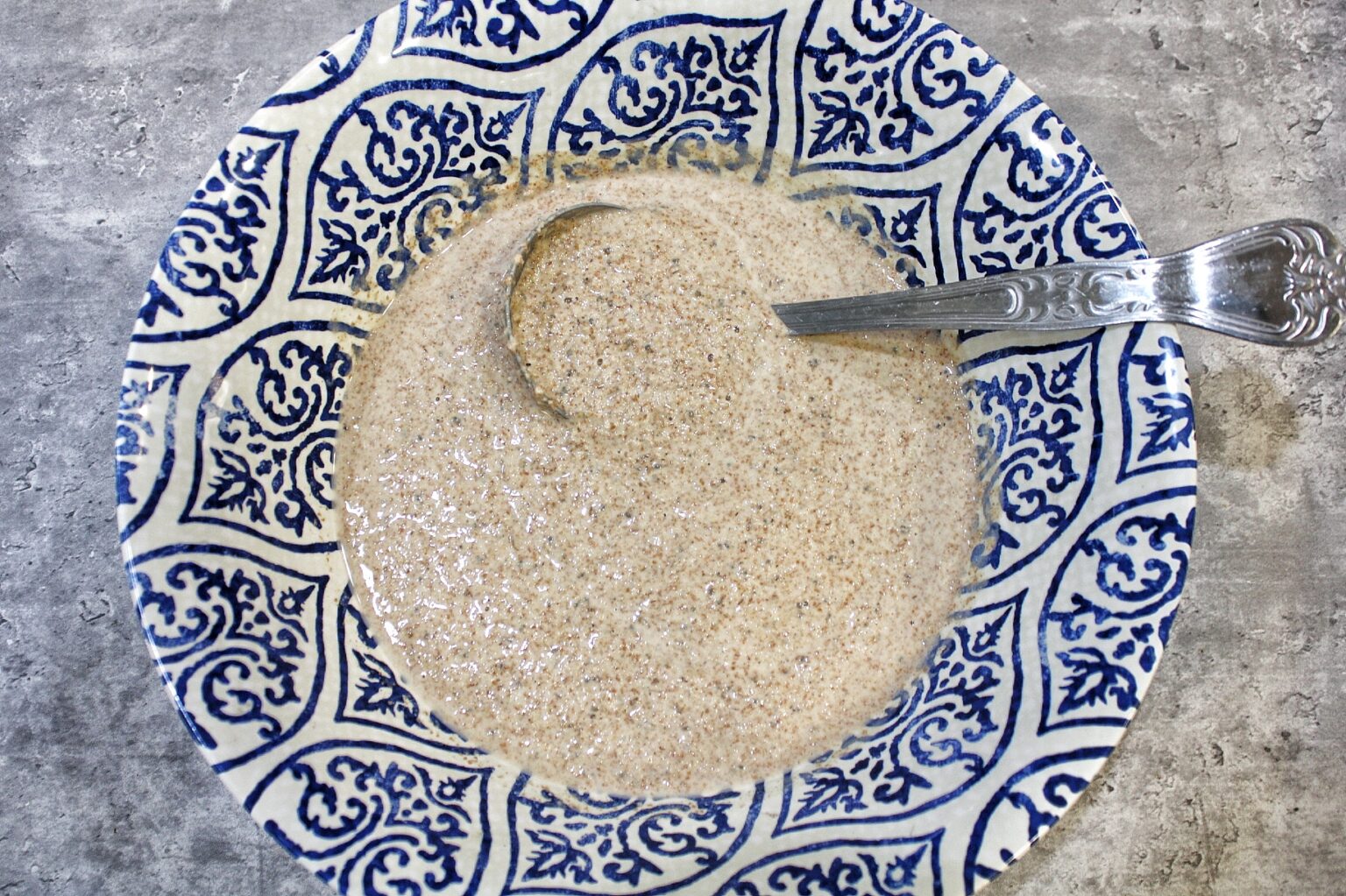 Oat bran pancake batter in a large bowl.