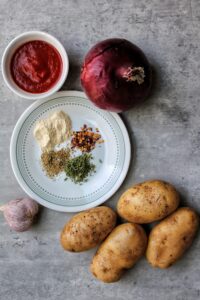 Stewed Potatoes with Tomato Sauce and Garlic - Plant Based And Broke