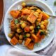 Bowl of chickpea sweet potato curry over white rice.