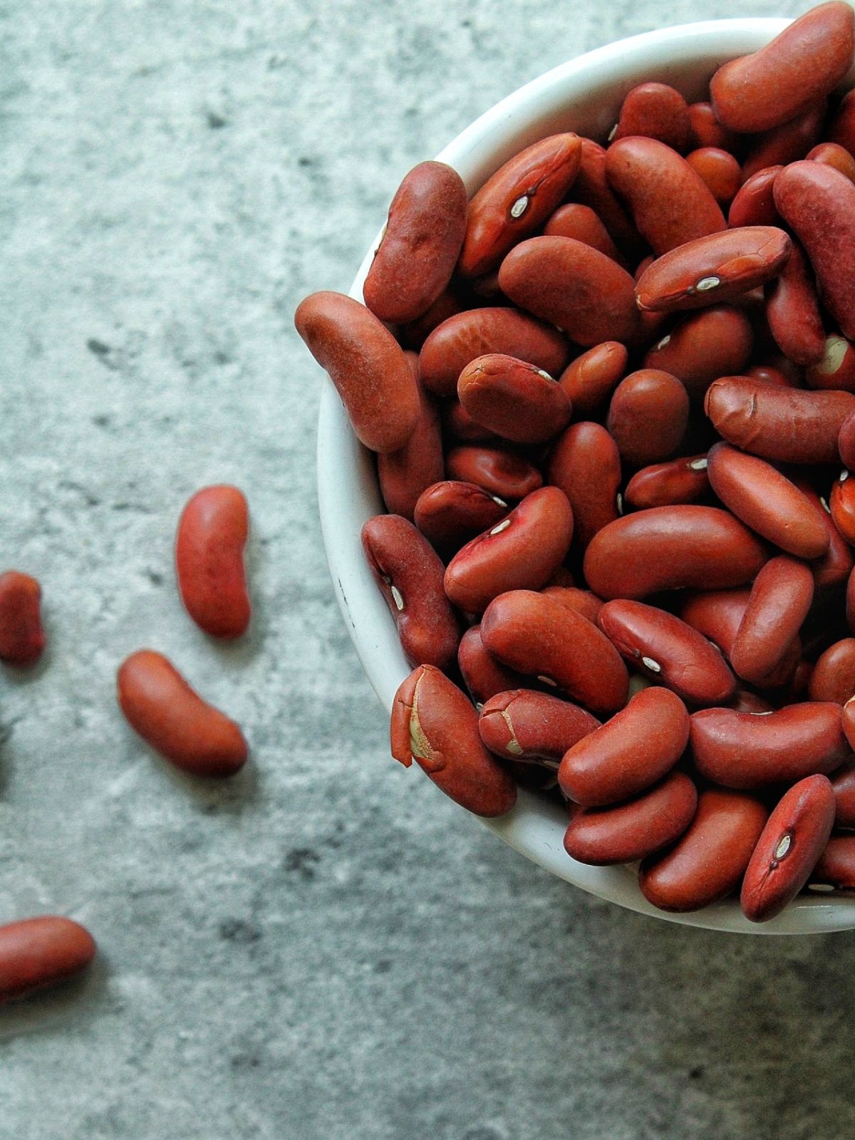 Closeup bowl or uncooked red kidney beans. 