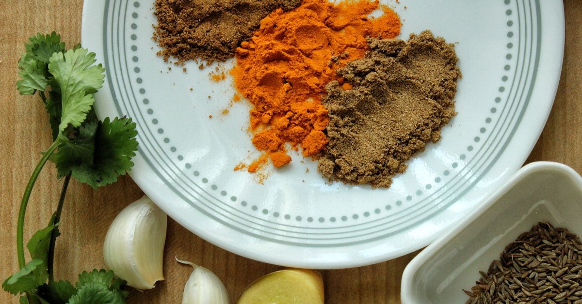 Spices for red lentil soup: Garam masala, turmeric, coriander. 