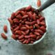 Small bowl of uncooked red kidney beans.