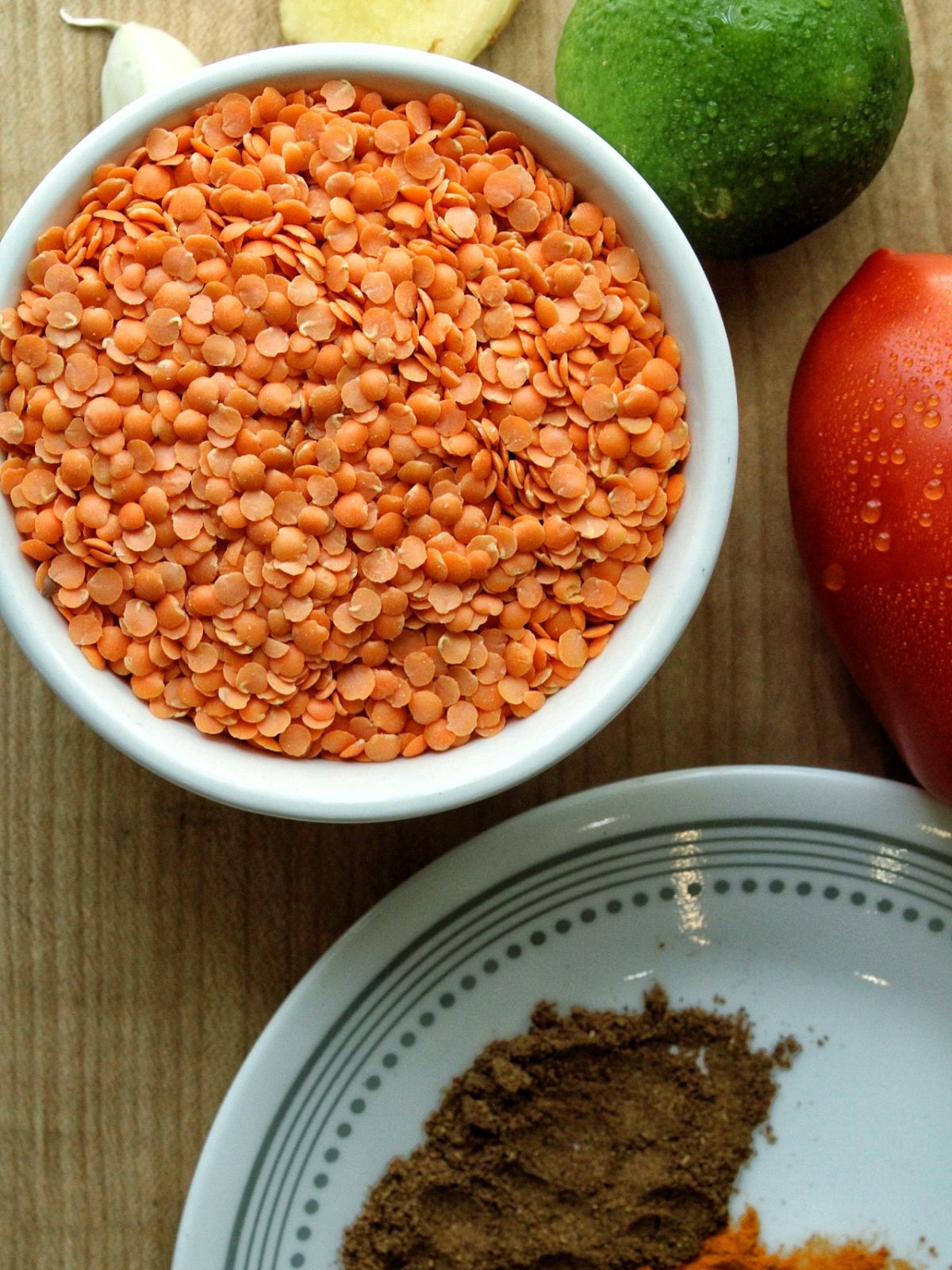 Uncooked red lentils in a bowl. 