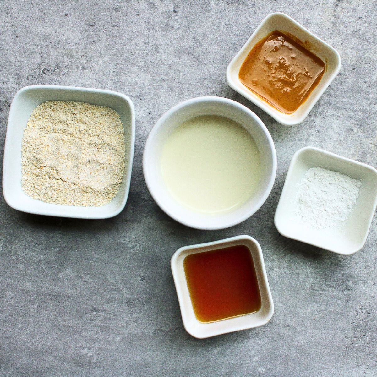 Ingredients: oat flour, maple syrup, baking powder, oat milk, and peanut butter.